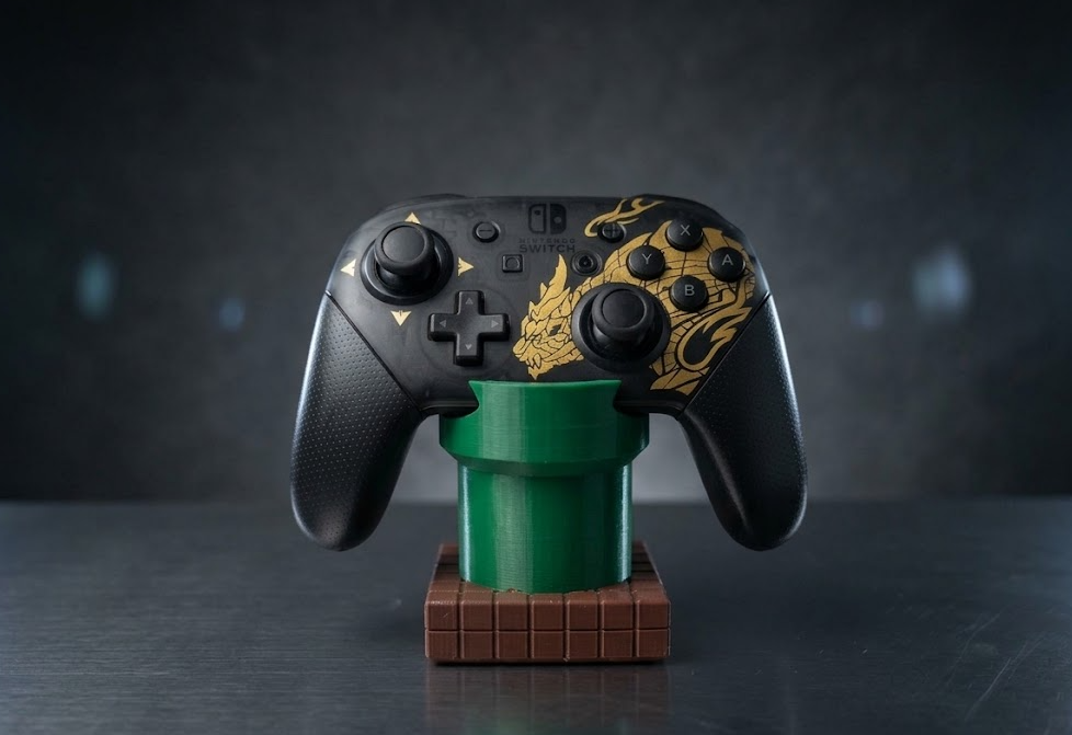 Soporte para control Pro de Nintendo Switch con forma de tubería